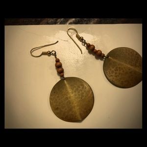 Hammered metal and wood earrings.